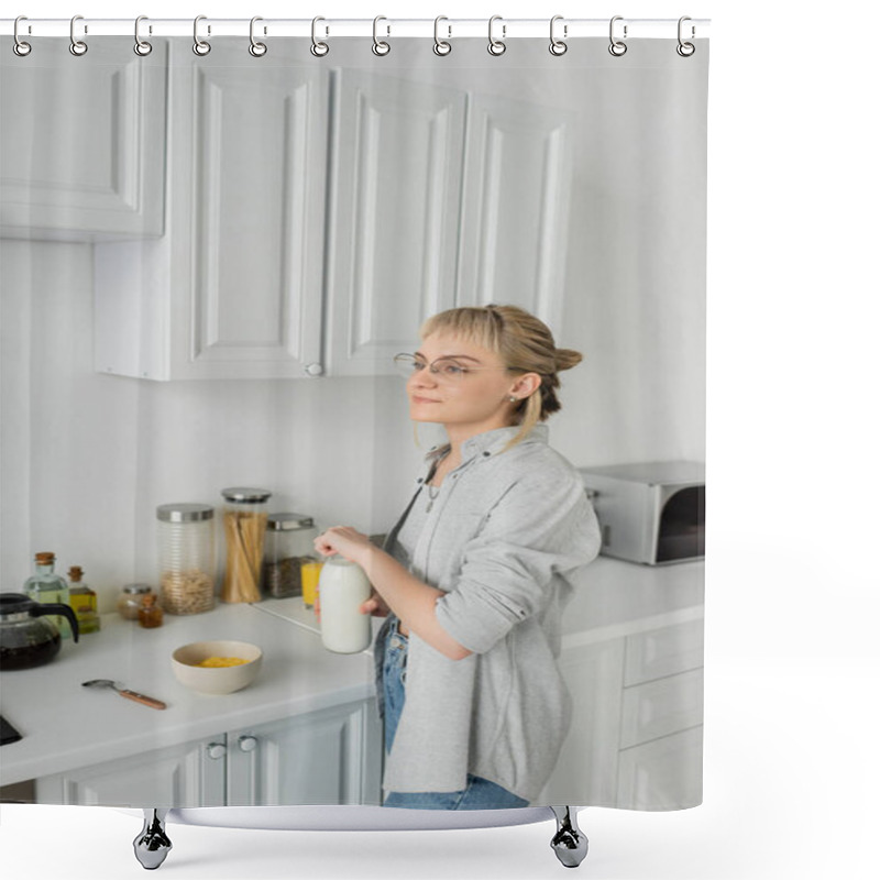 Personality  Young Woman In Eyeglasses And Short Hair With Bangs Holding Bottle With Milk Near Bowl With Cornflakes While Making Breakfast And Standing In Casual Clothes Next To Kitchen Appliances At Home  Shower Curtains