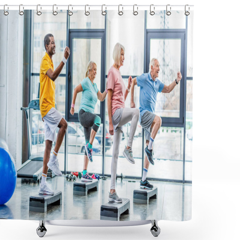 Personality  Side View Of Multiethnic Senior Athletes Synchronous Exercising On Step Platforms At Gym Shower Curtains