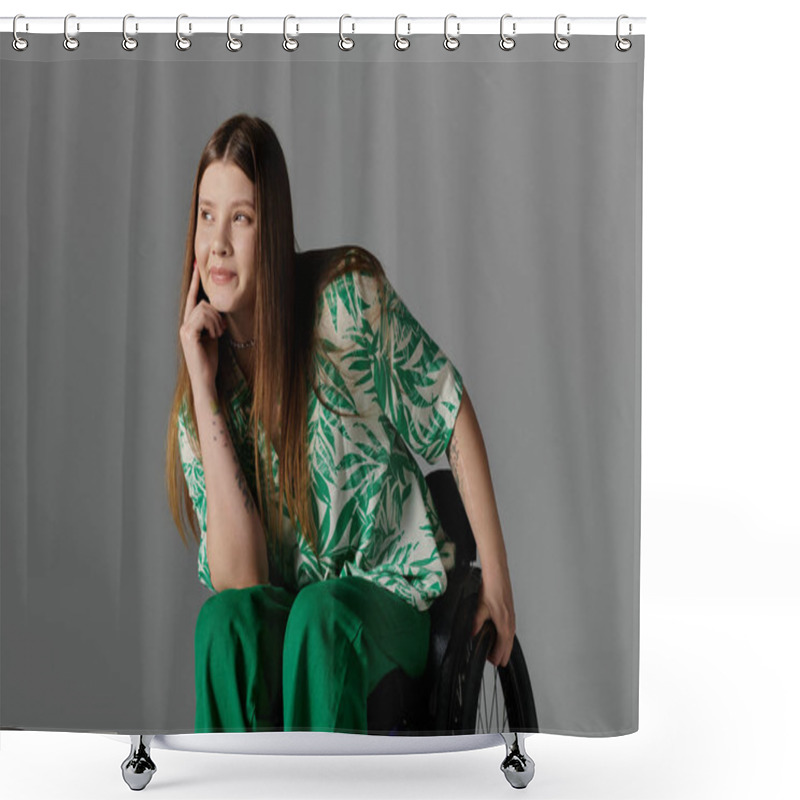 Personality  A Disabled Young Woman In Green Attire Strikes A Pose While Sitting In A Wheelchair Against A Grey Background. Shower Curtains