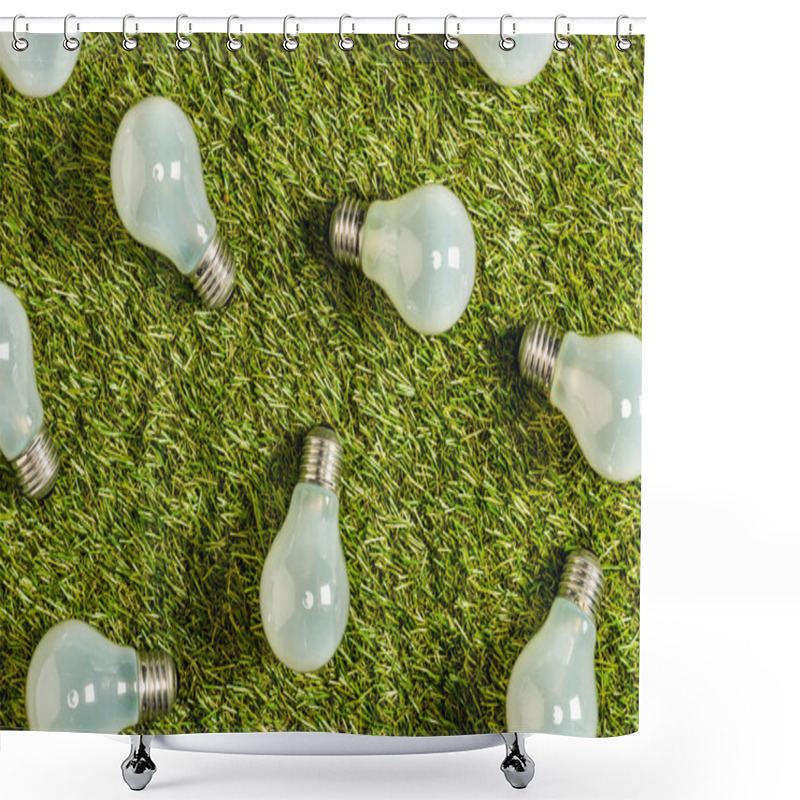 Personality  Top View Of Modern Fluorescent Lamps On Green Grass, Energy Efficiency Concept Shower Curtains