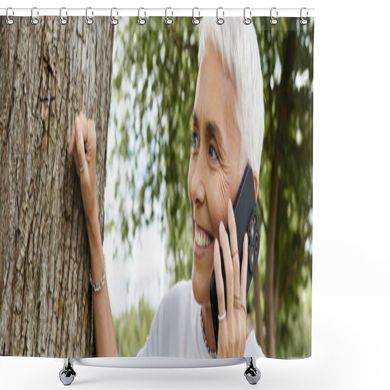 Personality  A Mature Woman Enjoys A Phone Call While Surrounded By Greenery. Shower Curtains