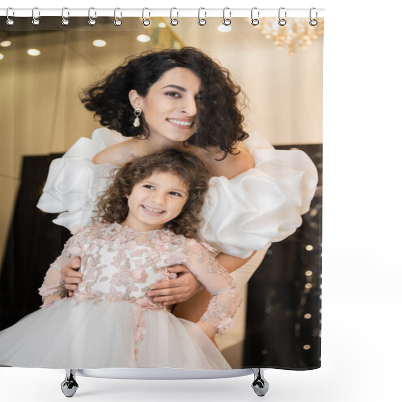 Personality  Gorgeous Middle Eastern Bride With Brunette Hair Standing In White Wedding Dress With Puff Sleeves And Ruffles Behind Cute Daughter And Smiling Together In Bridal Store, Looking At Camera  Shower Curtains