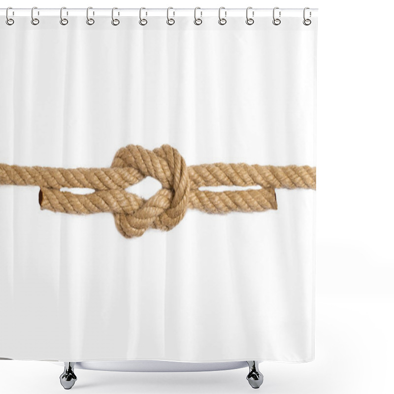 Personality  Rope Isolated. Macro Of Figure Cross Node Or Knot From Two Brown Shower Curtains