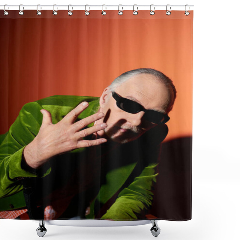 Personality  Expressive Senior Male Model In Dark Sunglasses And Green Velour Blazer Gesturing With Hand Near Face And Looking At Camera On Red And Orange Background With Shadow, Vibrant Aging Personality Shower Curtains