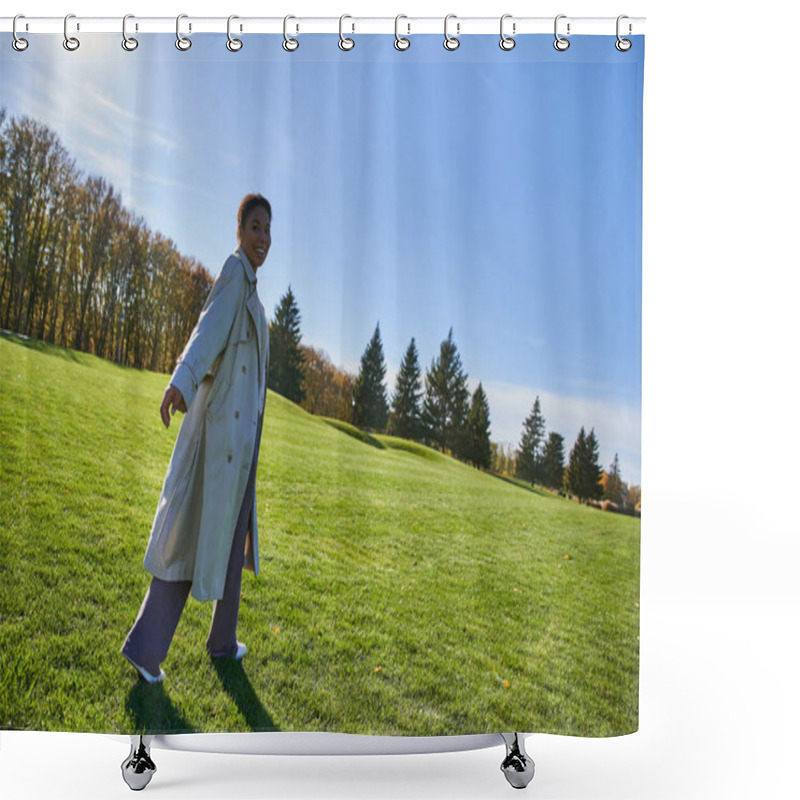 Personality  Happy Multiracial Woman In Trench Coat Walking On Grass In Park, Autumnal Fashion, Sunny Day Shower Curtains