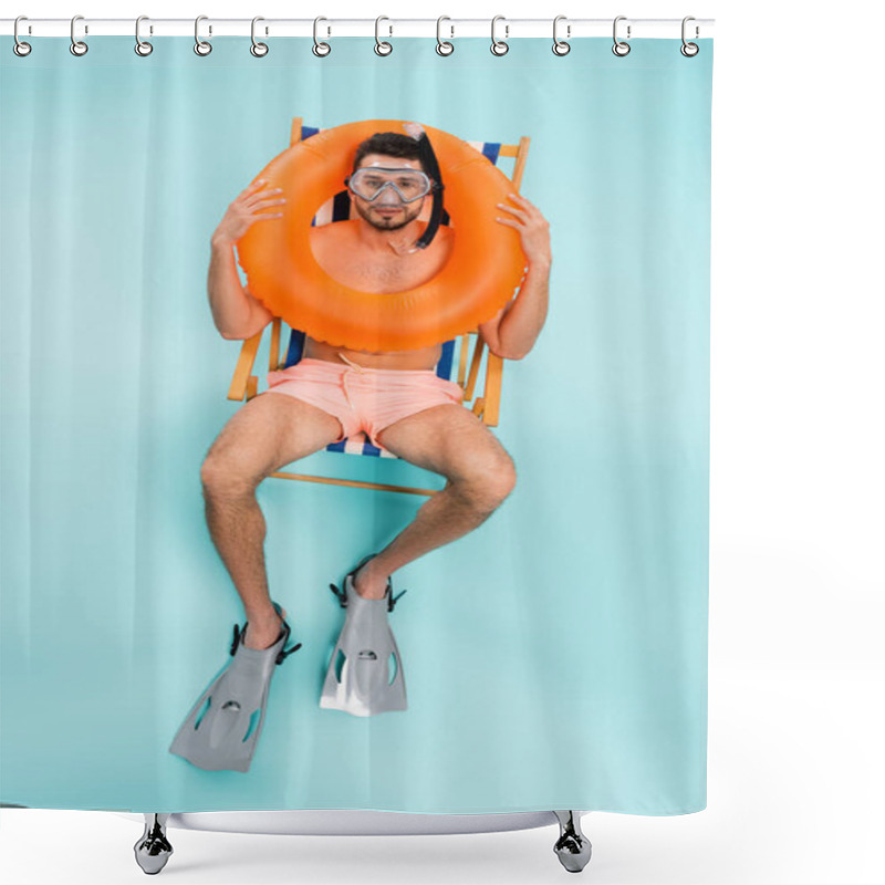 Personality  High Angle View Of Man In Swimming Goggles Holding Inflatable Ring On Blue Background  Shower Curtains