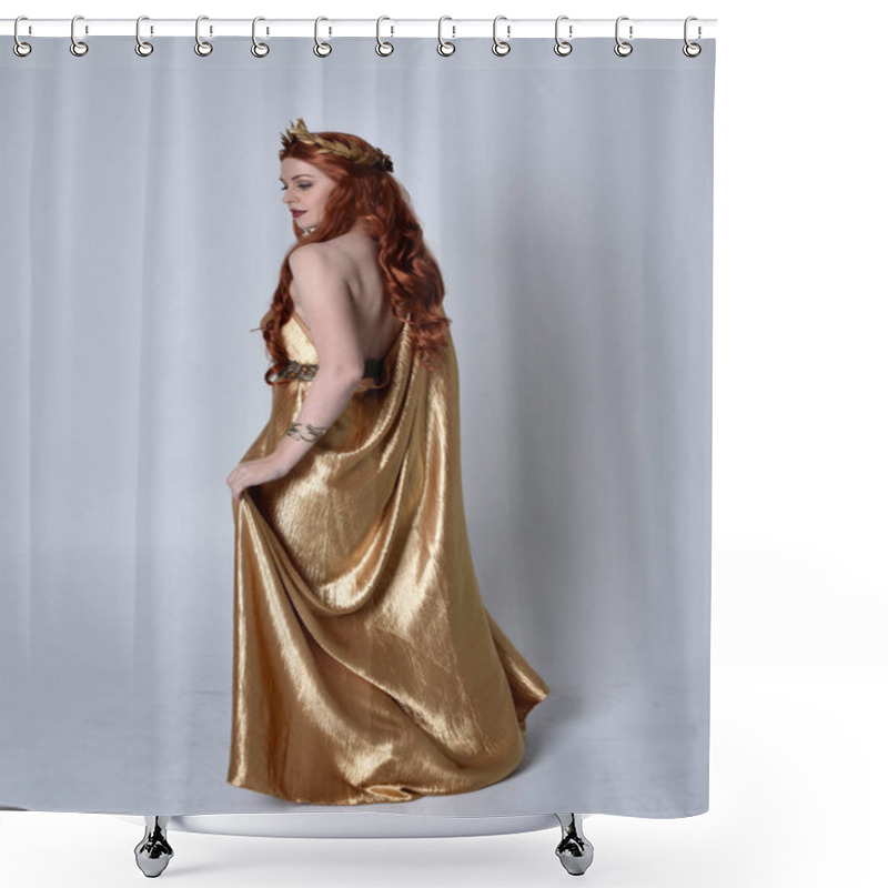 Personality  Full Length Portrait Of Girl With Red Hair Wearing Long Grecian Toga And Golden Wreath. Standing Pose With Back To The Camera,  Isolated Against A Grey Studio Background. Shower Curtains