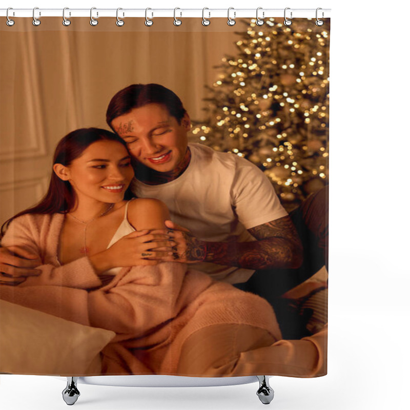 Personality  A Young Couple Cuddles And Smiles Together By A Decorated Christmas Tree. Shower Curtains