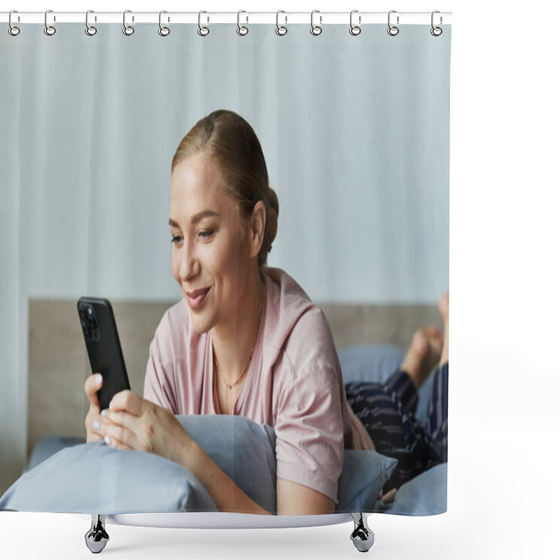 Personality  A Young Woman Lounges Comfortably On Her Bed, Engaging With Her Smartphone And Smiling. Shower Curtains