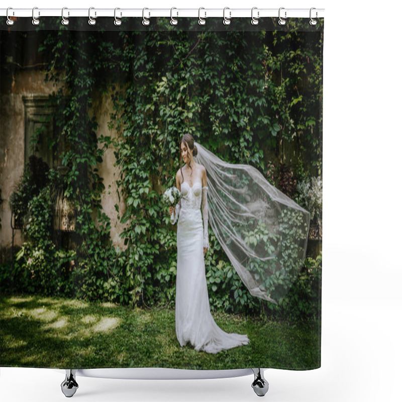 Personality  Valmiera, Latvia - August 15, 2024 - Bride In A Lace Gown Holding A Bouquet, Standing In Front Of Greenery With Her Veil Flowing In The Wind, Looking Serene And Elegant. Shower Curtains