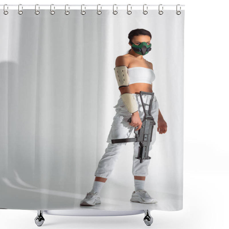 Personality  Futuristic African American Woman In Safety Mask With Assault Rifle On White Background Shower Curtains