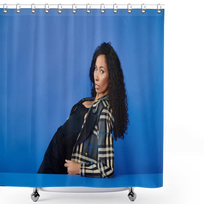 Personality  A Stunning Woman Showcases Her Fashion Sense With A Playful Posture Against Vibrant Blue Tones. Shower Curtains