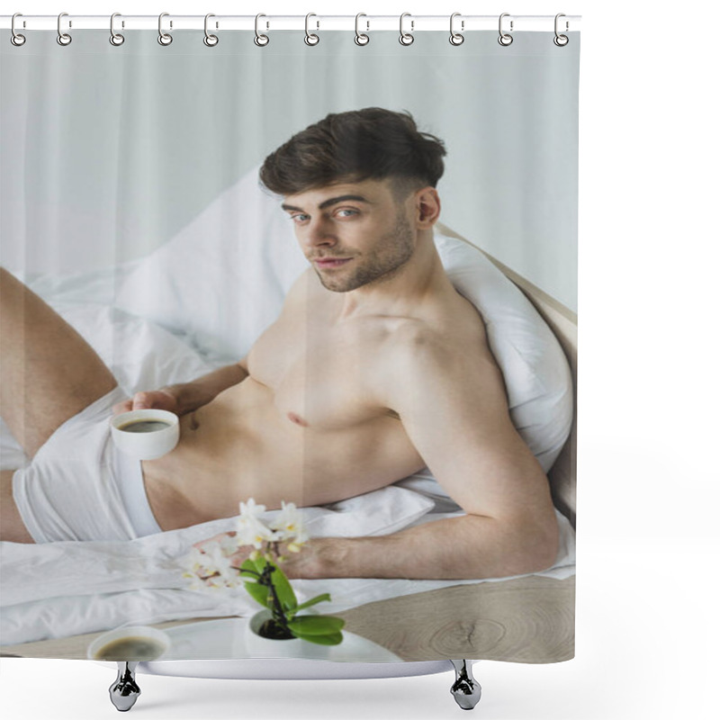 Personality  Handsome Man Holding Man Holding Coffee Cup And Looking At Camera While Lying On White Bedding In Underwear Shower Curtains