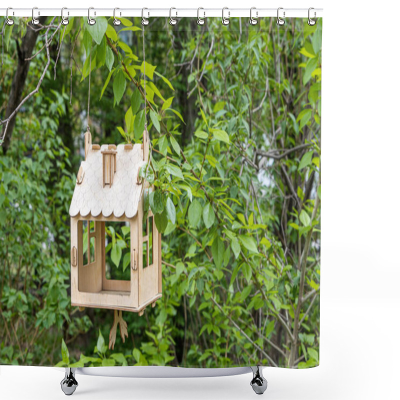 Personality  A New Yellow Bird And Squirrel Feeder House From Plywood Is Hanging On A Green Tree In A Park In Summer Shower Curtains