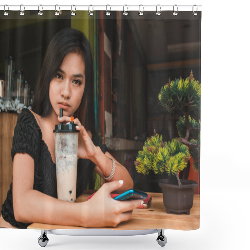 Personality  A Young Asian Woman With A Scornful And Contemptuous Look In Her Eyes, While Trying To Cool Off With A Serving Of Bubble Tea. Shower Curtains