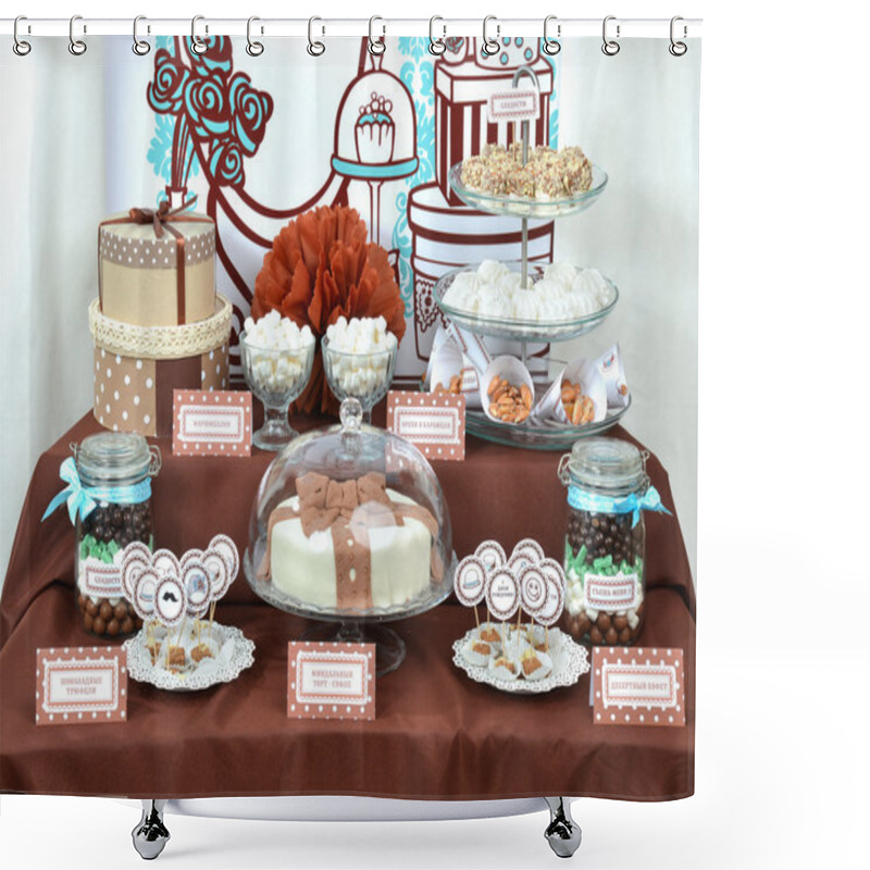 Personality  Fancy set table with sweets candies, cake, marshmallows, zephyr, shower curtains