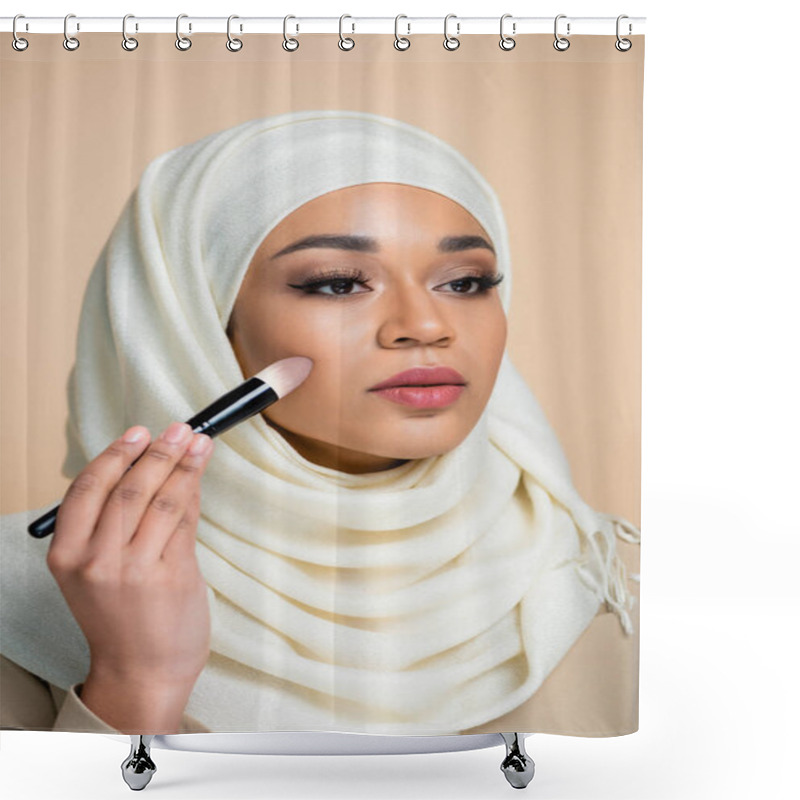 Personality  Young Muslim Woman In Hijab Applying Face Foundation Isolated On Beige Shower Curtains