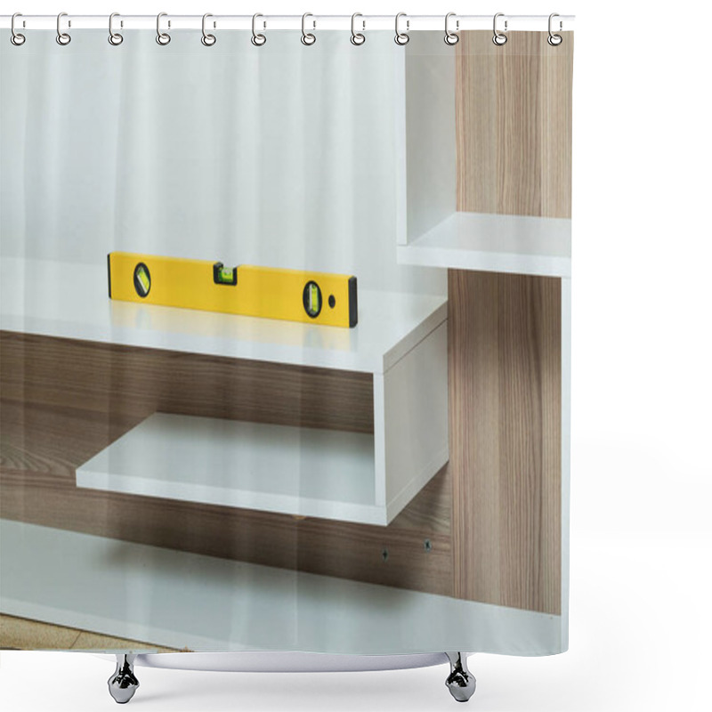 Personality  A Yellow Spirit Level Is Placed On Wood Shelf During The Installation Process, Ensuring Precise Horizontal Alignment. The Setup Highlights The Attention To Detail In Furniture Assembly And Home Shower Curtains