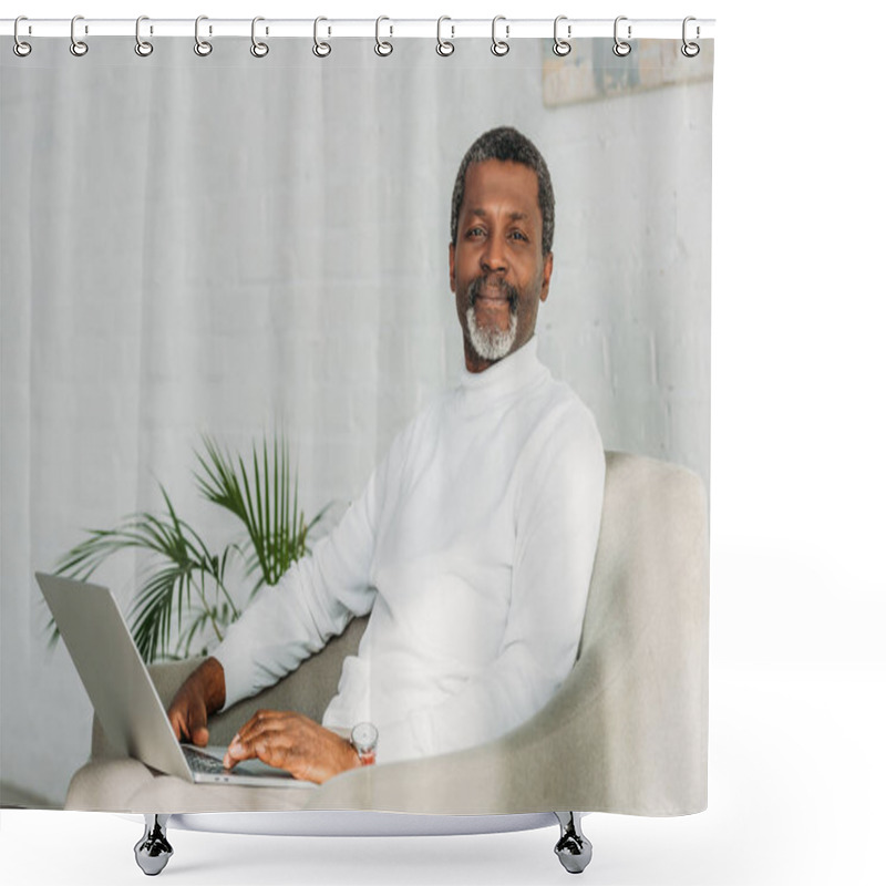 Personality  Senior African American Man Sitting In Armchair With Notebook And Smiling At Camera Shower Curtains