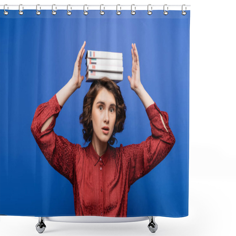 Personality  Discouraged Student With Textbooks Of Foreign Languages Above Head Looking At Camera Isolated On Blue Shower Curtains