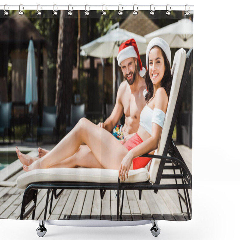 Personality  Cheerful Man And Woman In Santa Claus Hats Sitting On Wooden Deck Chairs  Shower Curtains