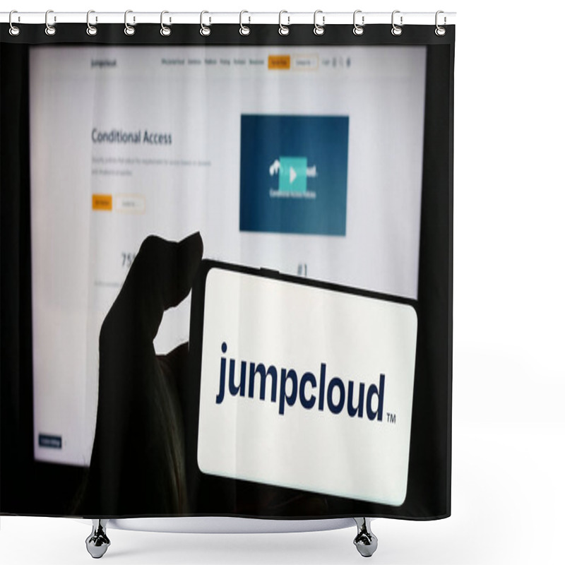 Personality  Stuttgart, Germany - 05-27-2024: Person Holding Mobile Phone With Logo Of American Cloud Software Company JumpCloud Inc. In Front Of Business Web Page. Focus On Phone Display. Shower Curtains