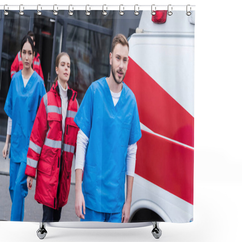 Personality  Young Male And Female Paramedics Walking Near Ambulance Shower Curtains