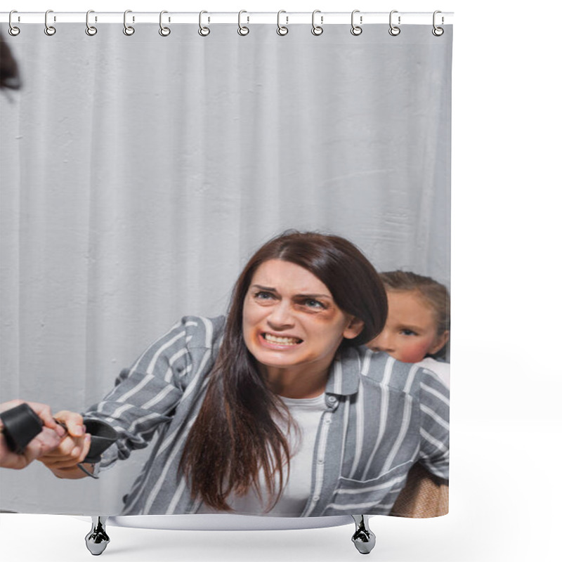 Personality  Scared Woman With Bruises On Face Hiding Kid Near Hand Of Husband Holding Waist Belt On Blurred Foreground  Shower Curtains