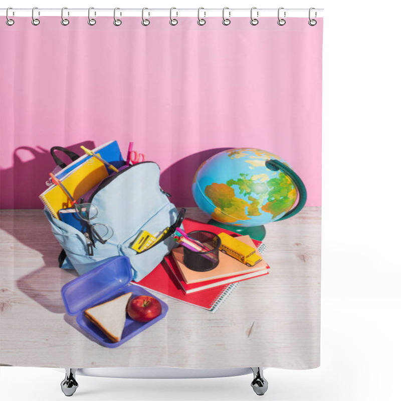 Personality  High Angle View Of Backpack With School Supplies Near Globe, Lunch Box, Stationery And School Bus Model On Pink Shower Curtains