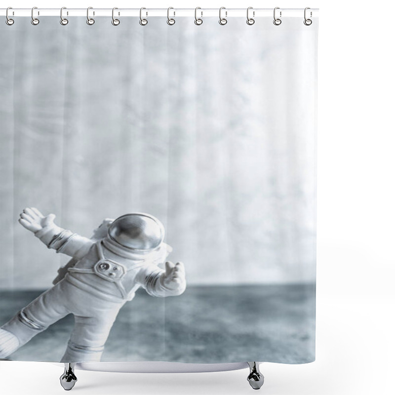 Personality  Miniature Astronaut In Spacesuit Peeking Waving His Hand On Gray Background Shower Curtains