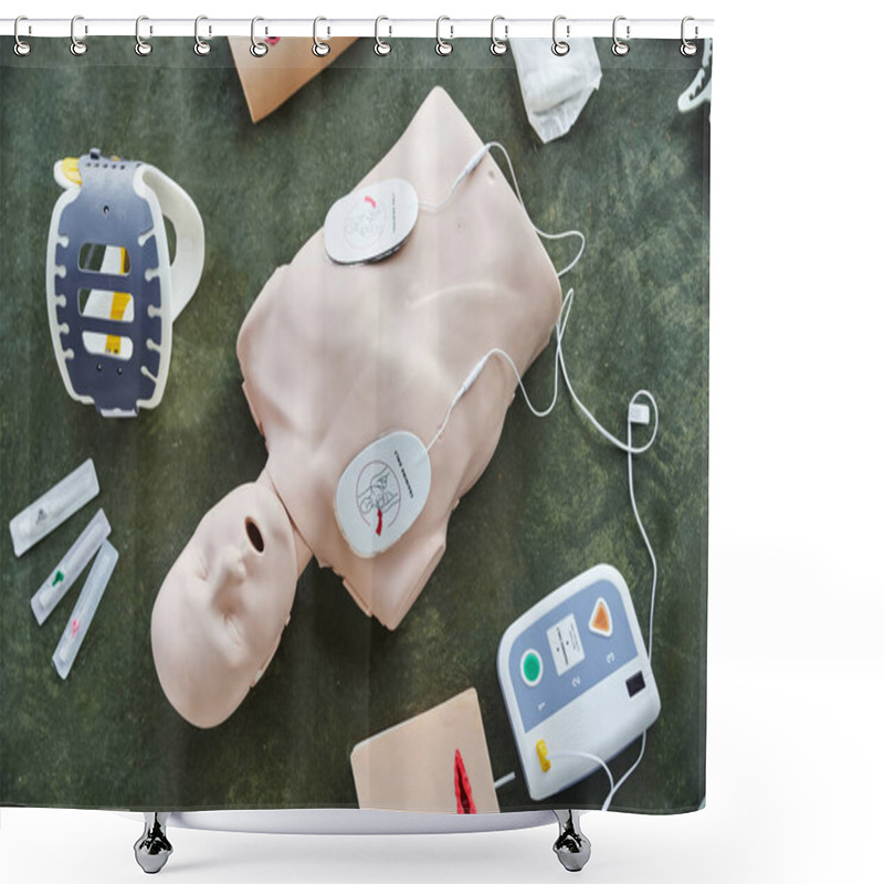 Personality  Top View Of CPR Manikin Near Automated Defibrillator, Wound Care Simulators, Neck Brace And Syringes On Floor In Training Room, Medical Equipment For First Aid Training And Skills Development Shower Curtains