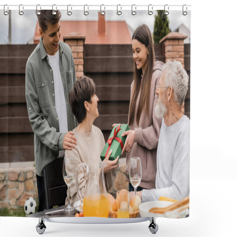 Personality  Smiling Teenage Daughter Giving Gift Box To Middle Aged Mother Near Brother And Father During Parents Day Celebration And Barbeque Party At Backyard In June, Celebrating Parenthood Day Concept Shower Curtains