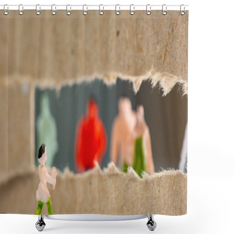 Personality  Selective Focus Of Toy Near Hole In Cardboard With Silhouettes Of People Figures At Background Shower Curtains