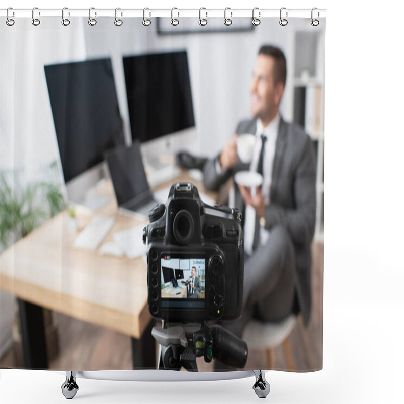 Personality  Selective Focus Of Digital Camera Near Businessman Holding Coffee Cup While Sitting Near Computers On Blurred Background Shower Curtains