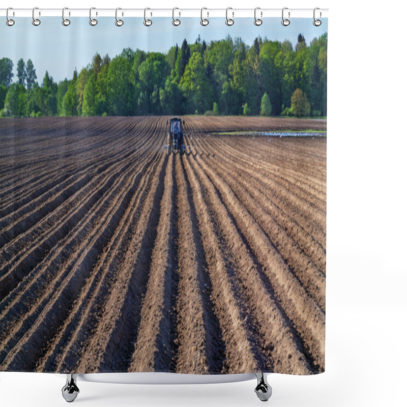 Personality  Tractor Sows Plowed Spring Field. Shower Curtains