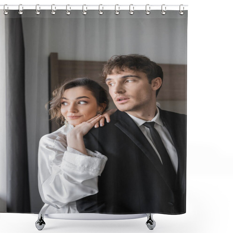 Personality  Young Bride In Jewelry And White Silk Robe Leaning On Shoulder Of Groom In Classic Formal Wear While Standing And Looking Away Together In Modern Hotel Room During Honeymoon, Newlyweds  Shower Curtains