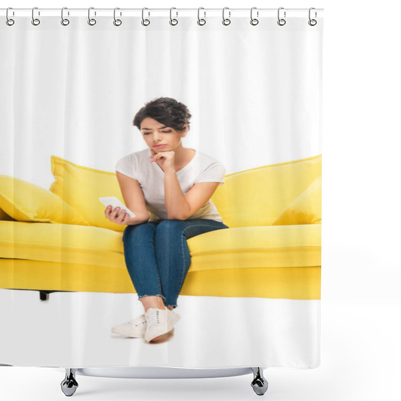 Personality  Upset Latin Woman Looking At Smartphone While Sitting On Sofa Isolated On White  Shower Curtains