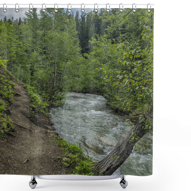 Personality  A Winding River Carves Through A Thick Forest With Lush Vegetation. The Rushing Water Follows A Natural Path, Flanked By Towering Trees And A Rugged Dirt Trail Along The Edge. Shower Curtains