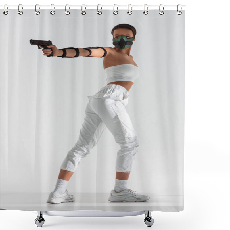 Personality  Futuristic African American Woman In Safety Mask Aiming Gun On White Background Shower Curtains