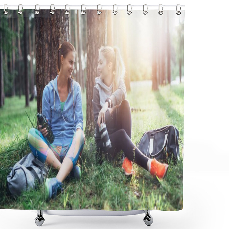 Personality  Two Young Women In Sportswear Sitting Under Trees In The Forest Drinking Water, Talking And Resting After Training Outdoors Shower Curtains