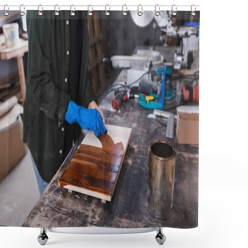 Personality  Cropped View Of Furniture Designer In Rubber Glove Applying Wood Stain On Board In Workshop  Shower Curtains