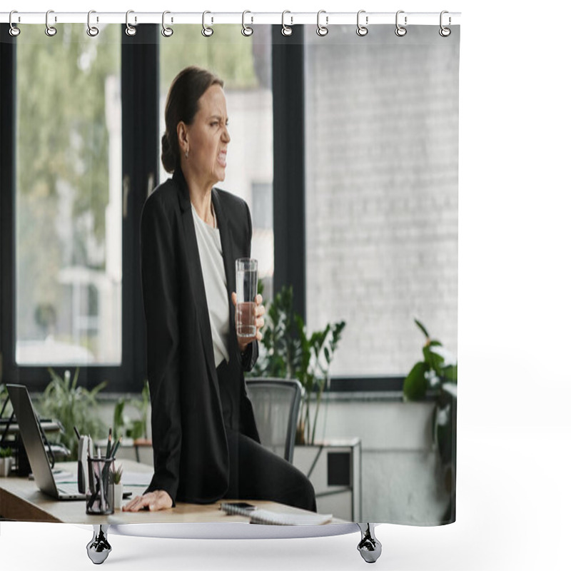 Personality  A Middle-aged Woman In Distress Sits At A Desk, Holding A Glass Of Water. Shower Curtains