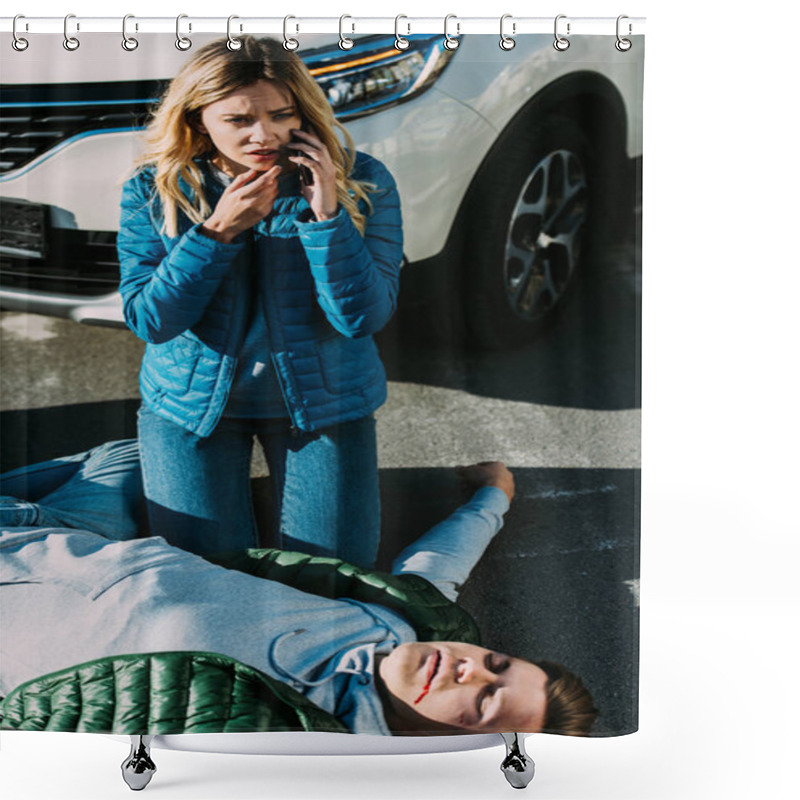 Personality  High Angle View Of Scared Young Woman Calling Emergency While Injured Man Lying On Road After Traffic Accident  Shower Curtains