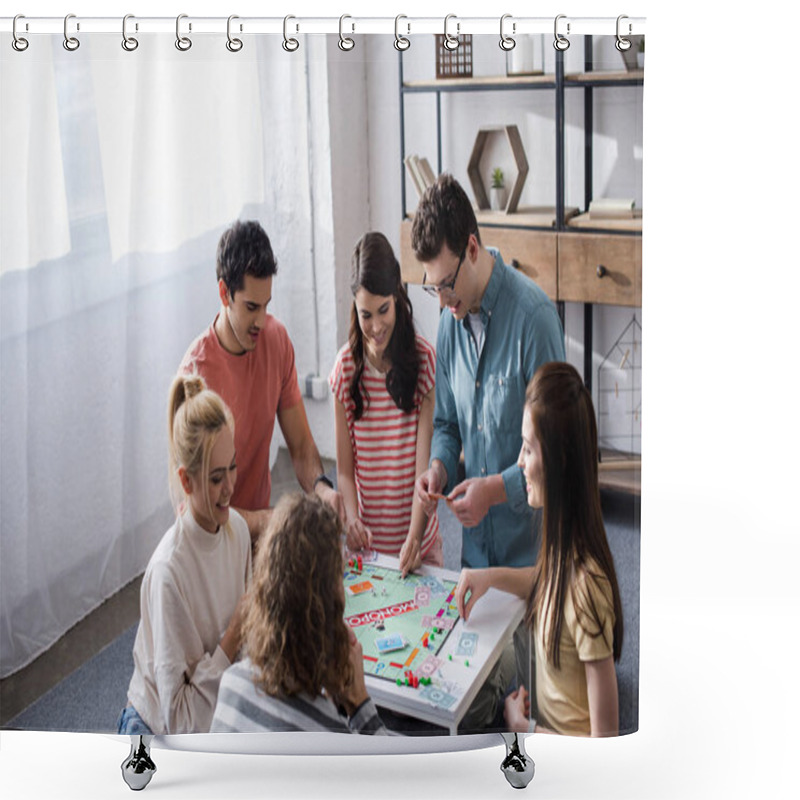 Personality  KYIV, UKRAINE - JANUARY 27, 2020: High Angle View Of Smiling Friends Playing Monopoly Game At Home Shower Curtains