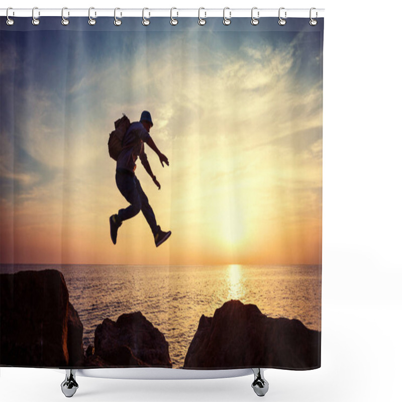 Personality  Brave Man With Backpack Jumping Over Rocks Near Ocean In Sunset Shower Curtains