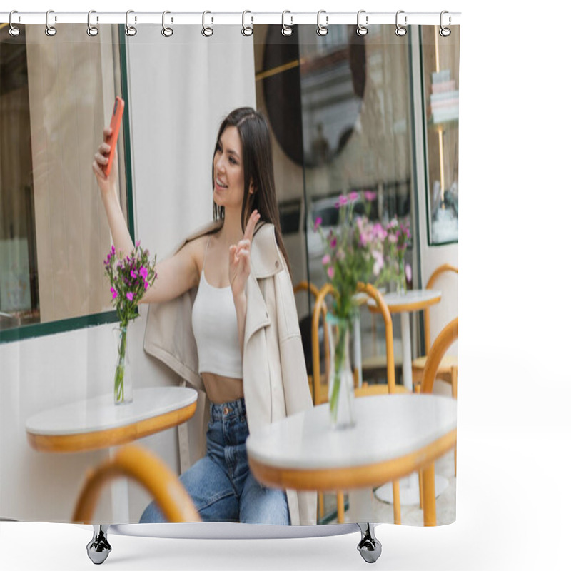 Personality  Happy Woman With Long Hair Sitting On Chair Near Bistro Table With Flowers In Vase And Taking Selfie, Shoving V Sign, Posing In Trendy Clothes In Cafe On Terrace Outdoors In Istanbul  Shower Curtains