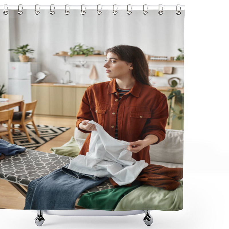 Personality  A Woman Stands Pensively, Folding Laundry In Her Cozy Kitchen, Expressing Her Inner Struggles. Shower Curtains