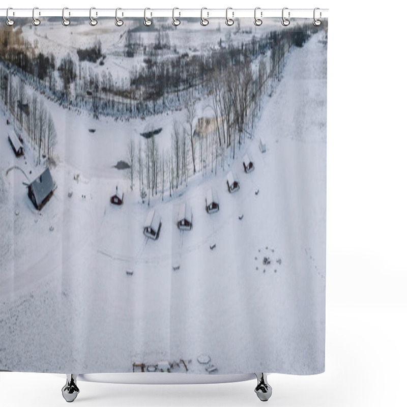 Personality  Aerial View Of Snow-covered Wooden Cabins Along A Frozen River, Surrounded By A Winter Landscape With Trees And Open Fields. Shower Curtains