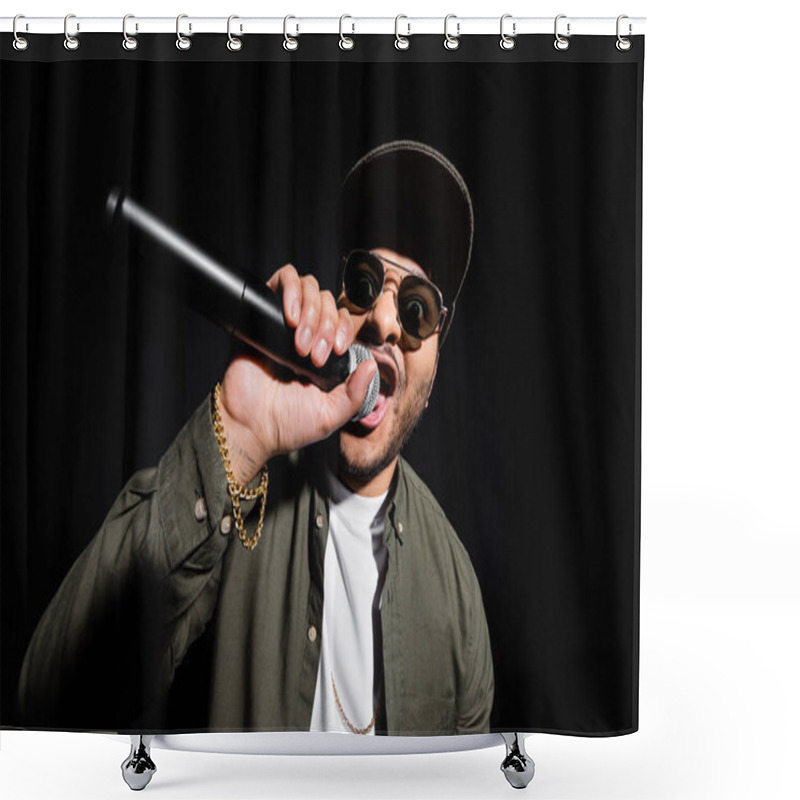 Personality  Emotional Middle East Hip Hop Singer In Sunglasses And Cap Singing In Microphone And Gesturing Isolated On Black Shower Curtains