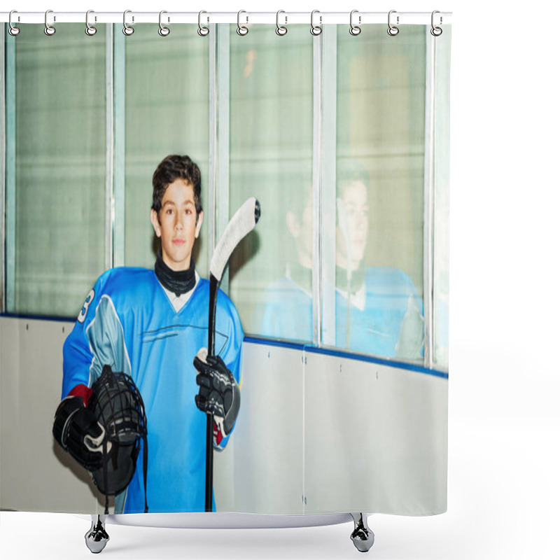 Personality  Portrait Of Teenage Boy, Professional Hockey Player In Blue Uniform, Standing On Ice Rink, Holding Helmet And Stick Shower Curtains